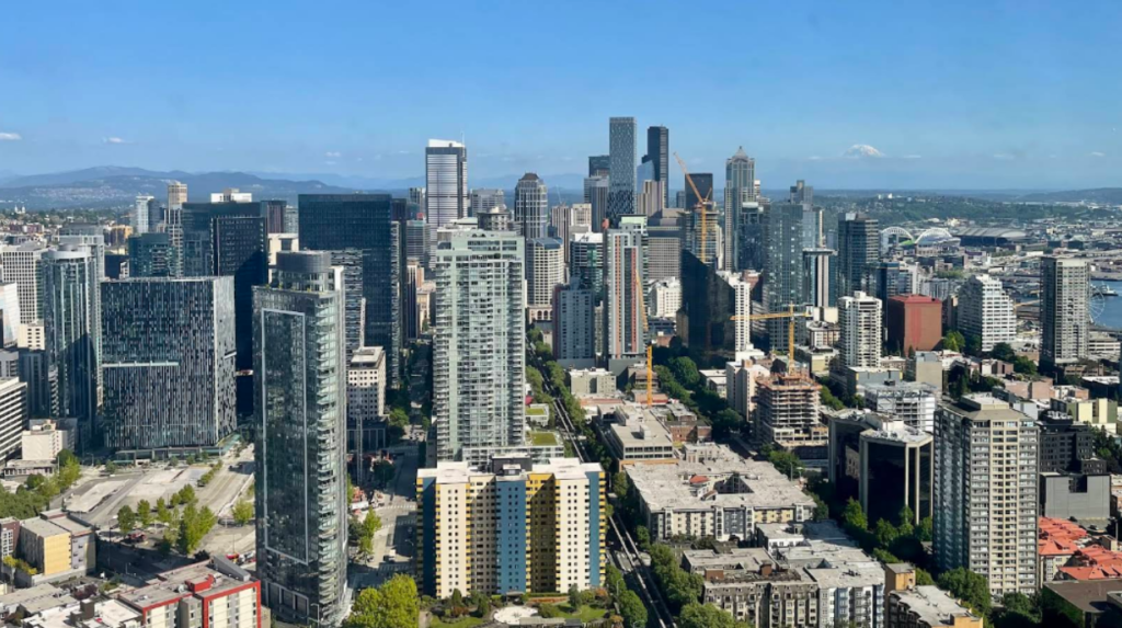 What should first-time visitors see in Seattle?