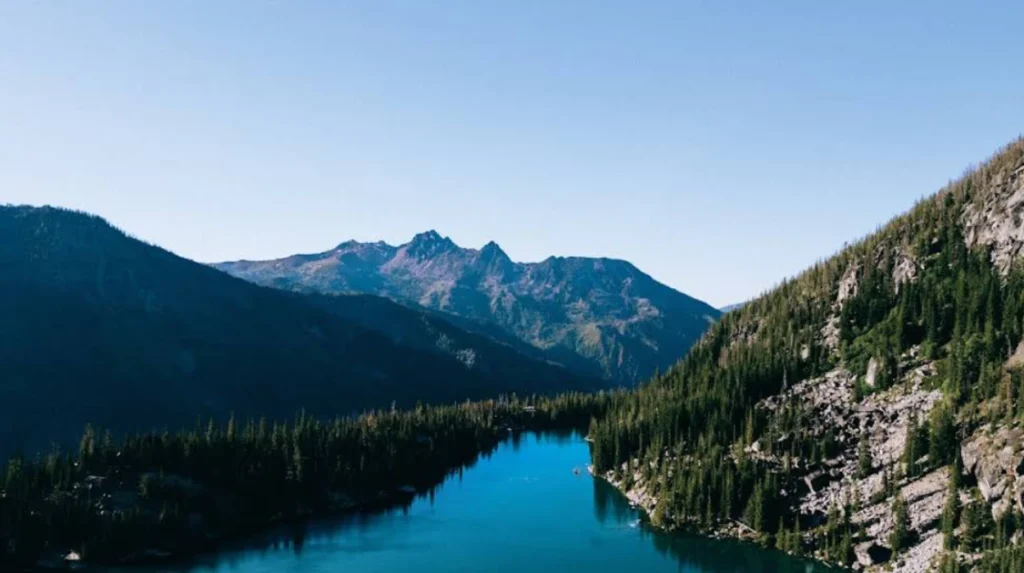 How can you hike Colchuck Lake safely?